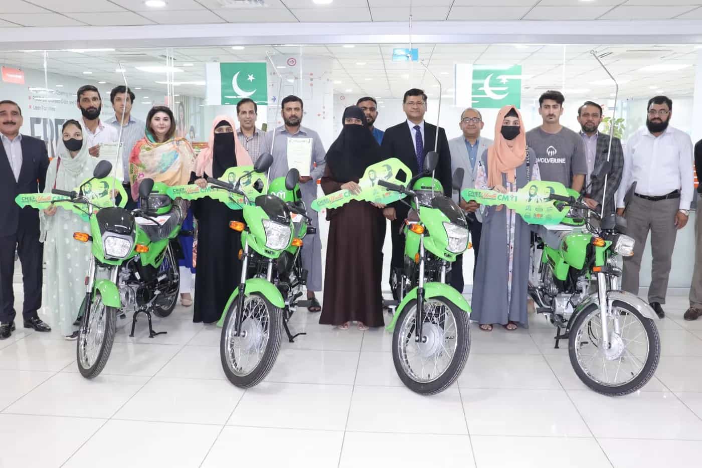 New green scheme motorcycles lined up for delivery to successful applicants